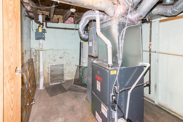 utilities featuring water heater and heating unit