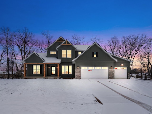 view of front of property with a garage