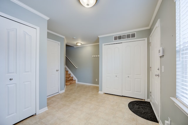 entrance foyer with ornamental molding