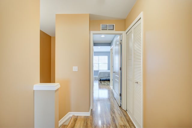 hallway featuring light wood-type flooring