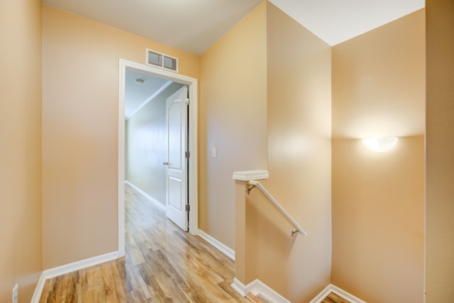 corridor featuring light hardwood / wood-style floors