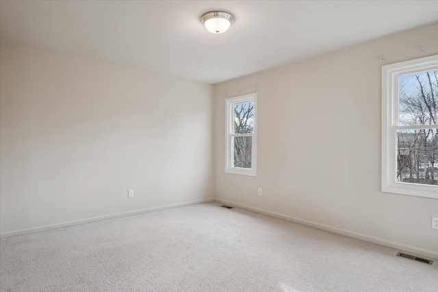 view of carpeted spare room