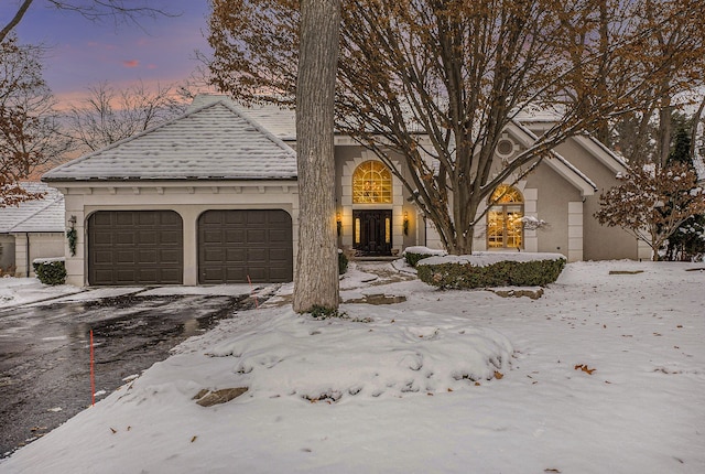 view of front of house with a garage