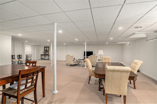 dining room with light colored carpet