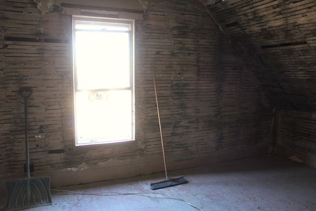 unfinished attic with visible vents