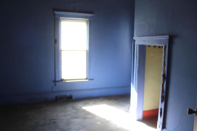 spare room featuring visible vents