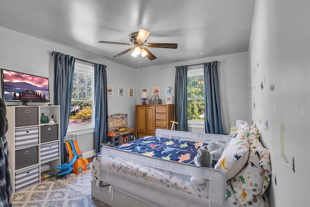 bedroom featuring ceiling fan