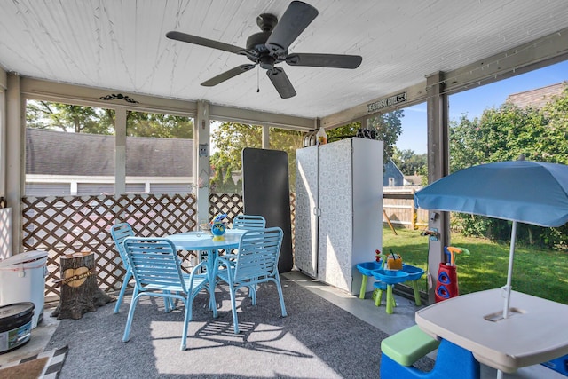 view of patio featuring ceiling fan