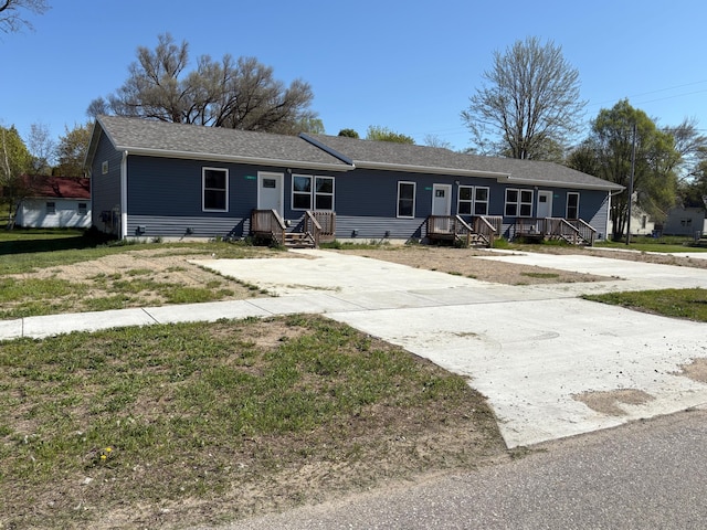 216 W 1st St, Evart, MI 49631 - view of ranch-style house