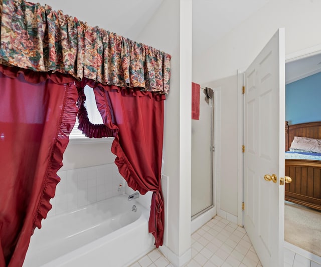 bathroom with tile patterned floors and plus walk in shower