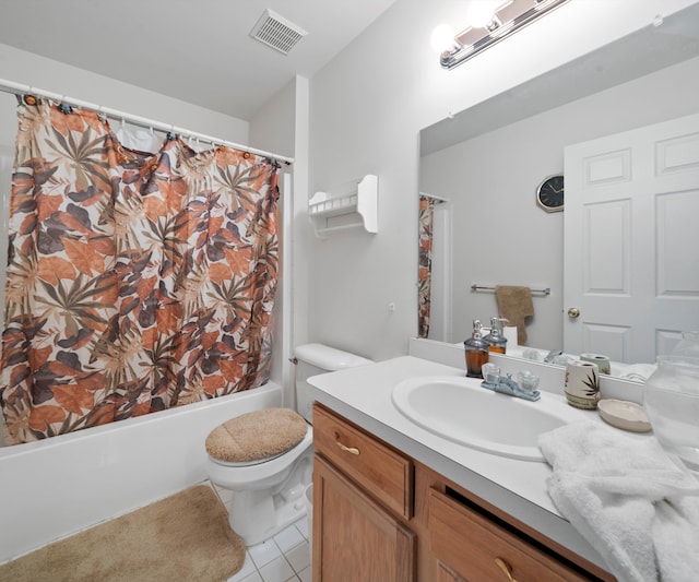 full bathroom with tile patterned floors, vanity, shower / bath combination with curtain, and toilet