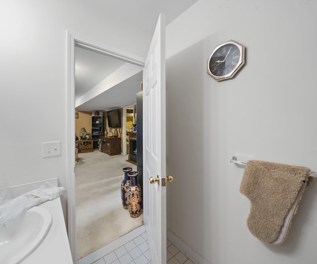 bathroom with tile patterned floors and vanity