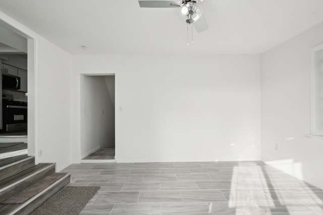 empty room with ceiling fan