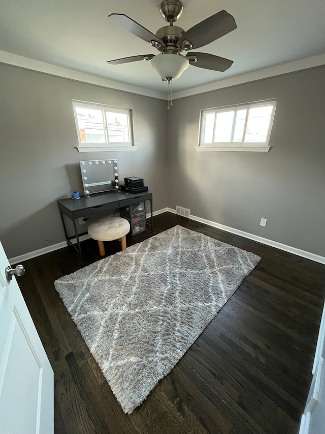 office with ceiling fan, dark hardwood / wood-style floors, and crown molding