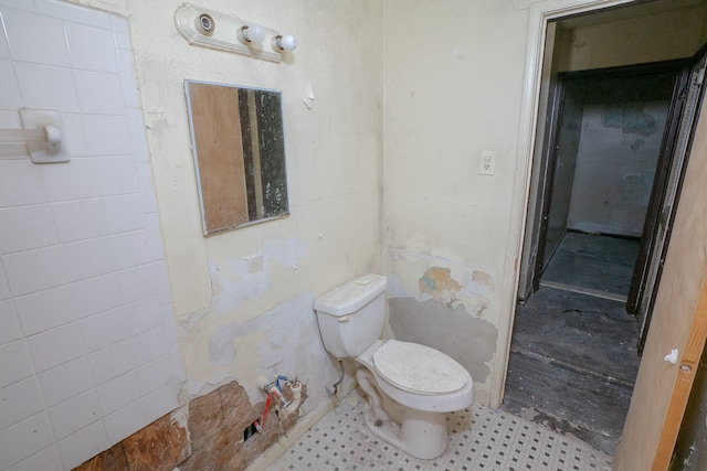16100 Liberal St, Detroit, MI 48205 - half bathroom featuring toilet and tile patterned floors