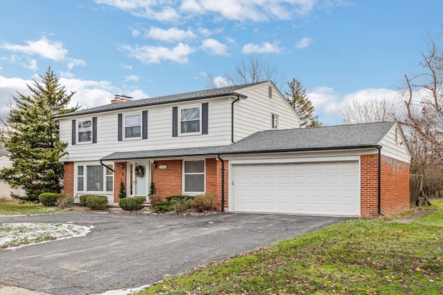 front of property with a garage