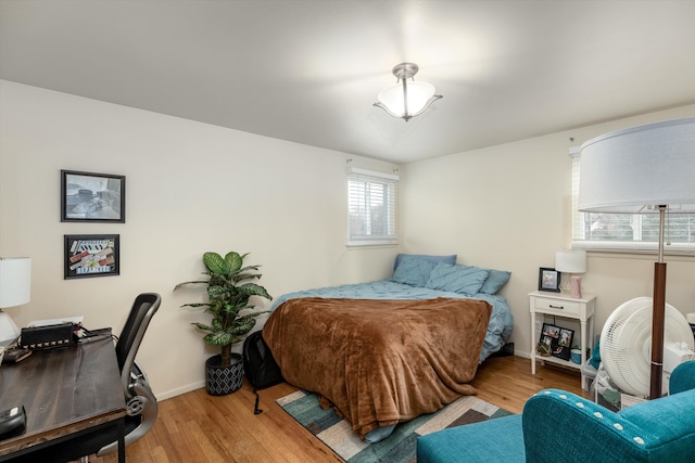 bedroom featuring light wood-type flooring