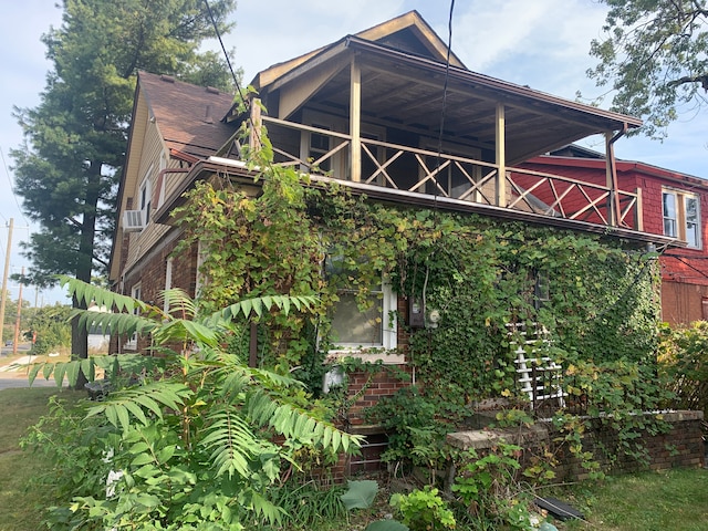 exterior space featuring a balcony