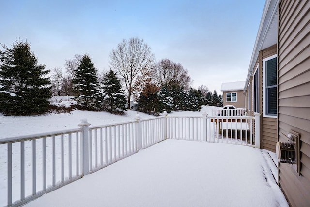 view of snow covered deck