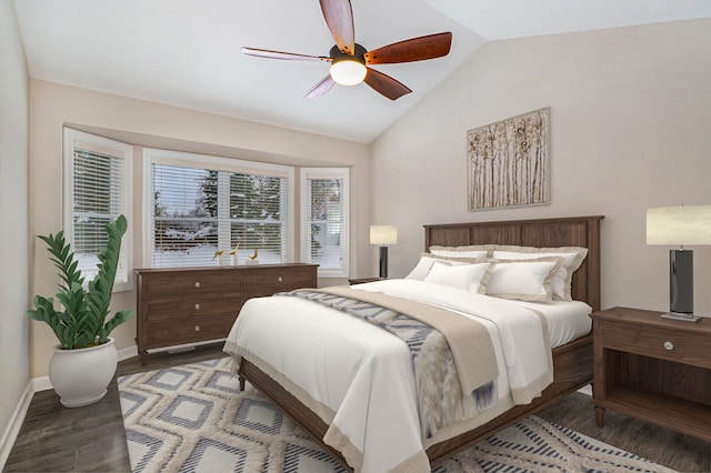 bedroom with hardwood / wood-style floors, ceiling fan, and lofted ceiling