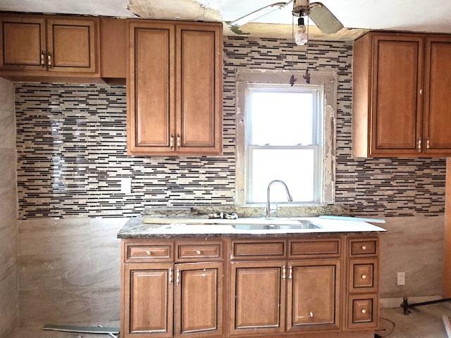 kitchen with decorative backsplash and ceiling fan