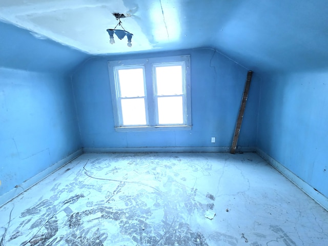 bonus room featuring vaulted ceiling