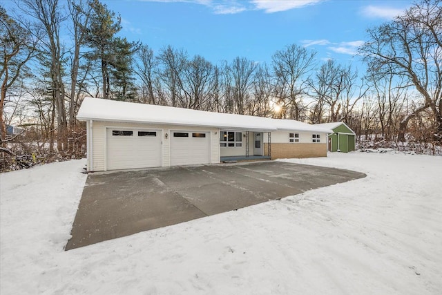 ranch-style home featuring a garage