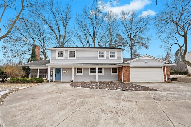 front facade with a garage