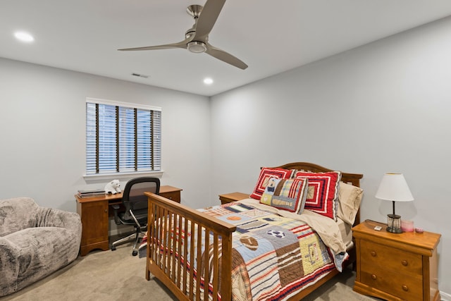 carpeted bedroom featuring ceiling fan