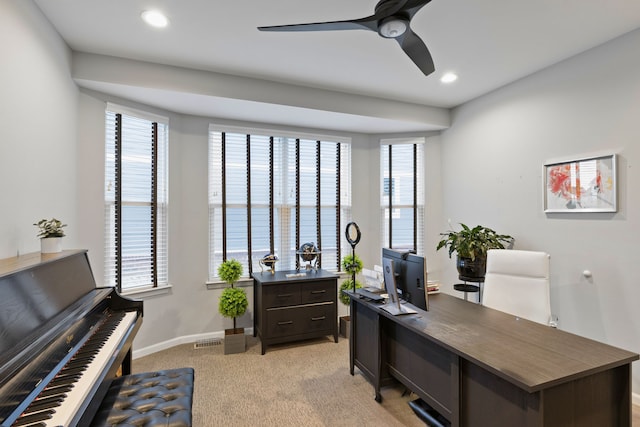 office area featuring ceiling fan and light colored carpet