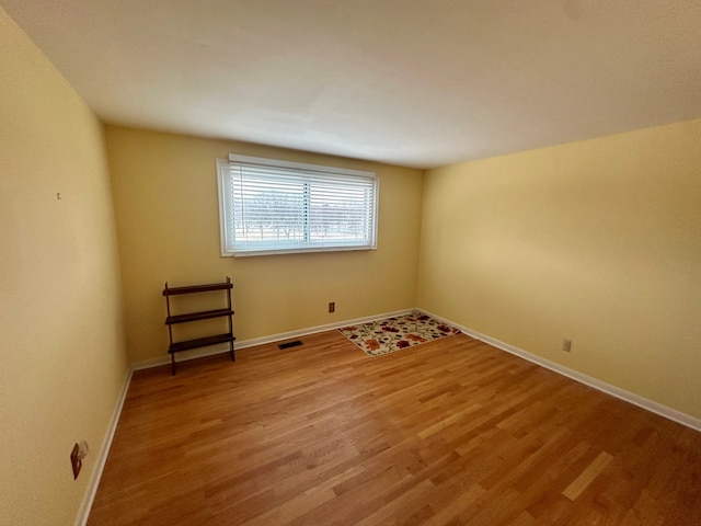 unfurnished room featuring light hardwood / wood-style floors