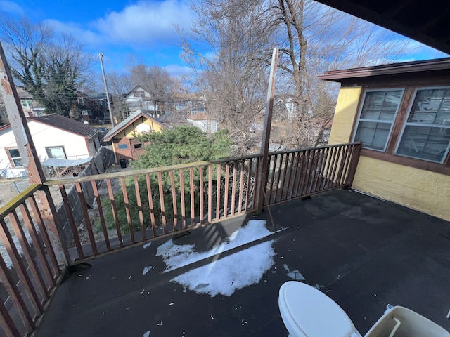 wooden deck featuring a residential view