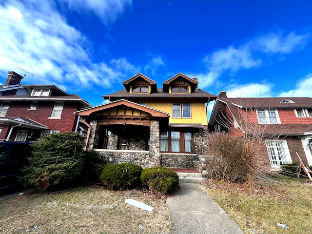 view of front of home with stone siding