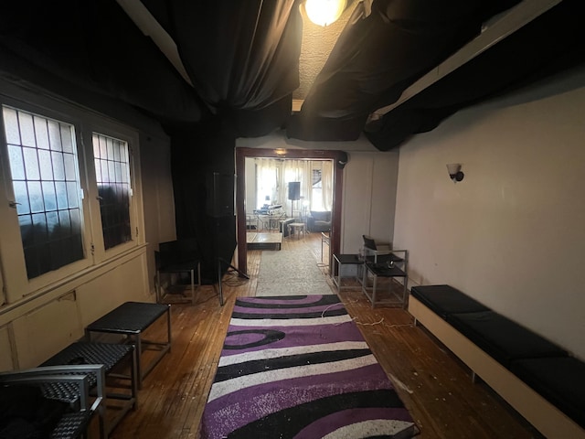 bedroom with hardwood / wood-style floors