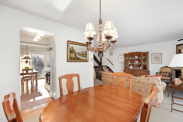 dining area featuring a chandelier