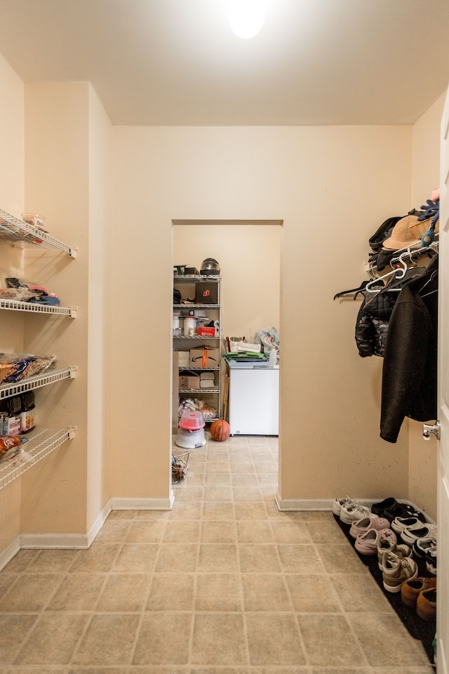 walk in closet featuring washer / clothes dryer