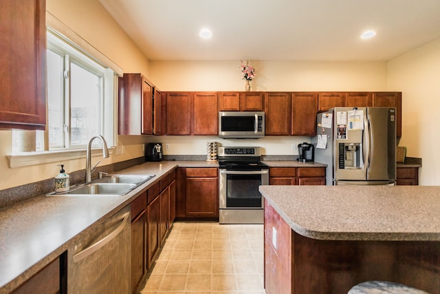 kitchen with appliances with stainless steel finishes and sink