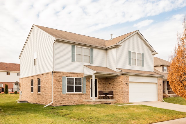 view of front facade with a garage and a front lawn