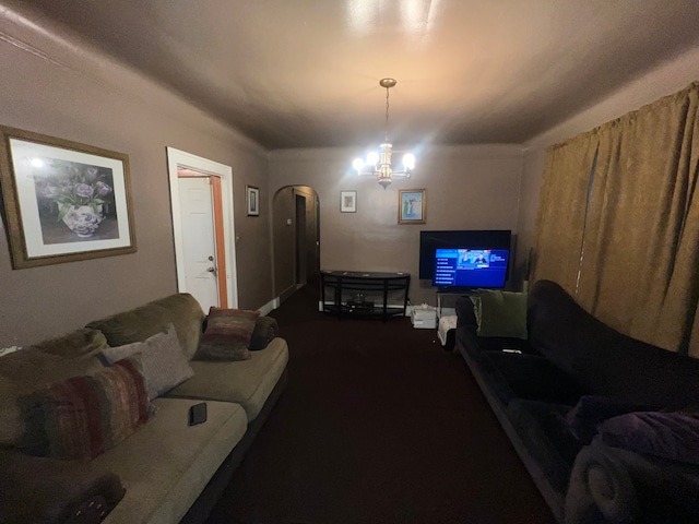 living room featuring a chandelier