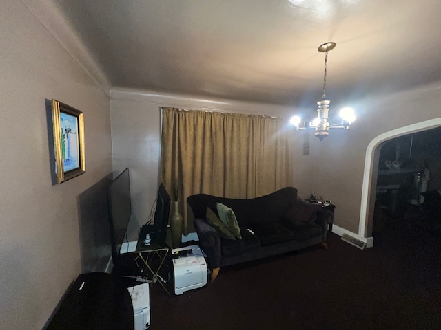 living room featuring a chandelier