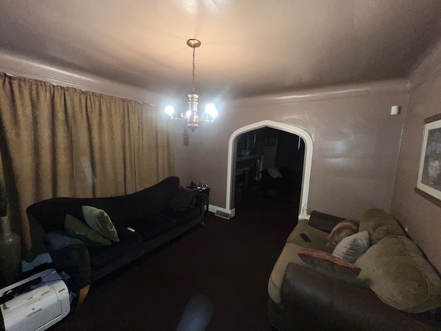 living room featuring a chandelier