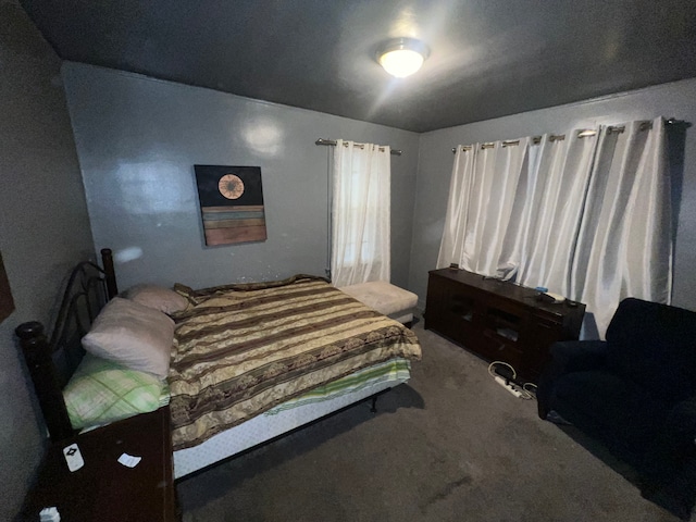 bedroom featuring carpet