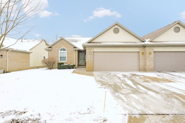 single story home with a garage