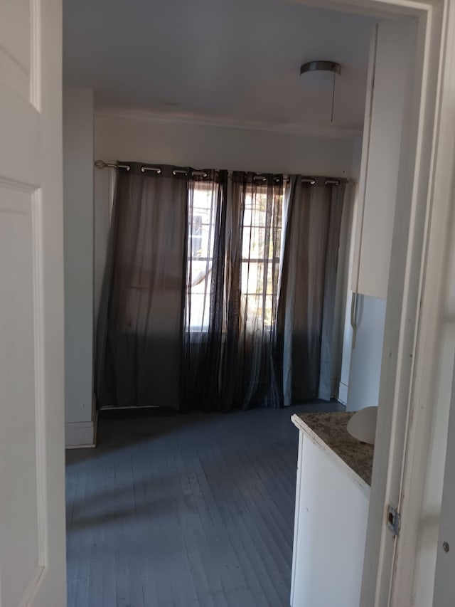 unfurnished room featuring hardwood / wood-style floors