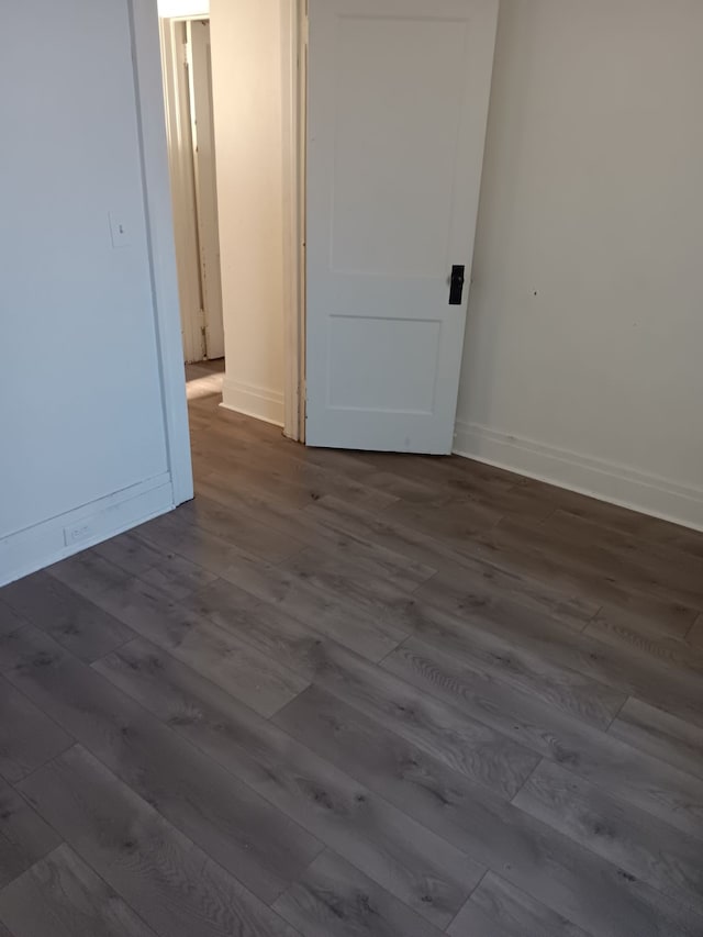 spare room featuring hardwood / wood-style floors