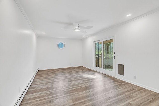 unfurnished room featuring ceiling fan, crown molding, and a baseboard radiator