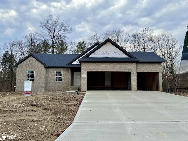 view of front of property with a garage