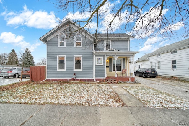 view of front property with covered porch