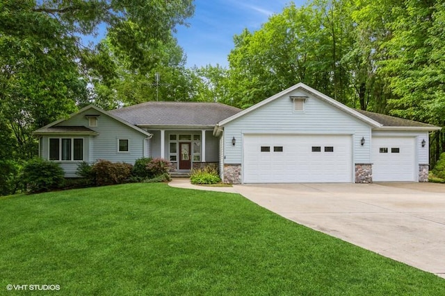 single story home with a front lawn and a garage