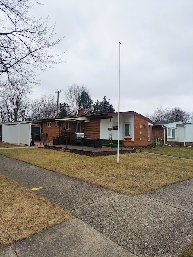 view of front of property with a front lawn